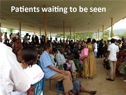 Photo of about 100 patients waiting to be seen at a clinic
