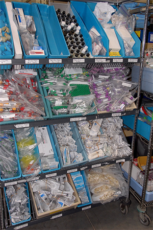 Photo of shelves full of dental supplies