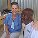 Photo of two smiling adults in a clinic