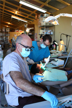 Photo of patient receiving treatment in a dental clinic