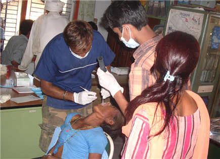 Photo of a person receiving dental care in a clinic 
